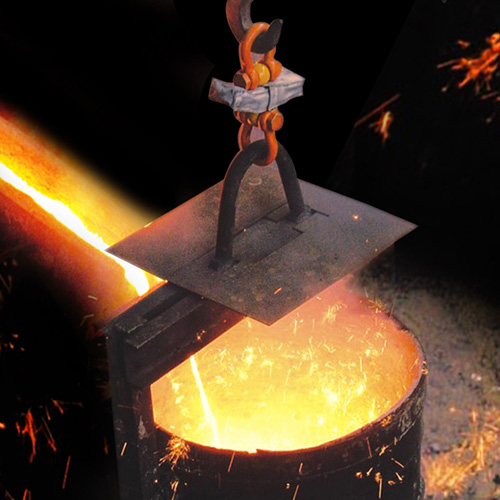 A ladle is filled with molten metal. It is suspended from a load cell wrapped in a heat shield
